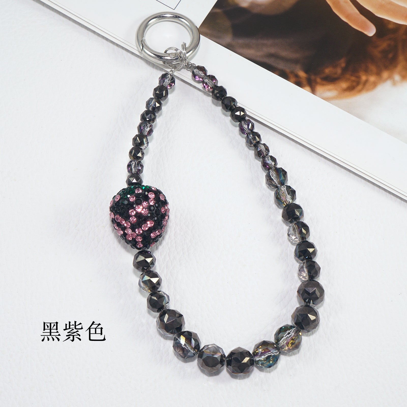 Purple and black strawberry crystal mobile phone strap